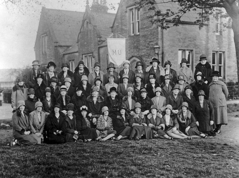 Mothers Union 1929.JPG - Long Preston Mothers Union 1929 - Picture taken on The Green.  All names Left to Right.    Back Row:  - Mrs W.J.Heaton - Mrs K.Shepherd - Mrs Straw - Mrs Sharp - Mrs Loveridge - Mrs F.Hewitt - ( Banner) - Mrs Jess Hardiman  - Mrs J.Handley - Mrs W.H. Popay - Mrs H.Astley - Mrs R.Parker - Mrs H.Hurcombe  2nd Row:  - Mrs Tom Delves - Mrs C.Allot - Mrs Newhouse - Mrs Brown - Mrs J.Kettlewell - Mrs Todd - Mrs Addison or Mrs H.Hedlis ( Station master's wife ) - Mrs W.Ward - Mrs Butt - Mrs Hall - Mrs T.Horner - Mrs O.Dawson  - Mrs T.Thompson ( Cobbler ) - Mrs Cave   3rd Row - seated:  -  Mrs A.Jowett - Mrs Stork - Mrs Ward - Mrs Watson ( Hoyle Hill ) - Mrs Crinon - Mrs Beecroft - Mrs R.Slater -  Mrs Len Foster - Mrs Tant Harrison - Mrs B.Whitton - Mrs Huddlestone - Mrs Harry Metcalfe   Front Row:  - Mrs C.Popay - Mrs J.Dodgson - Mrs T.Pye - Mrs C.Collishaw - Mrs Matt Jackman - Mrs A.Throup  - Mrs Addison ( Vicar's wife ) - "The speaker of the day"  - Mrs Tom Kayley - Mrs Jim Evans - Mrs A.Foster